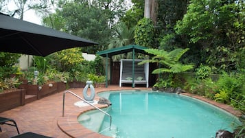 Outdoor pool, pool umbrellas, pool loungers