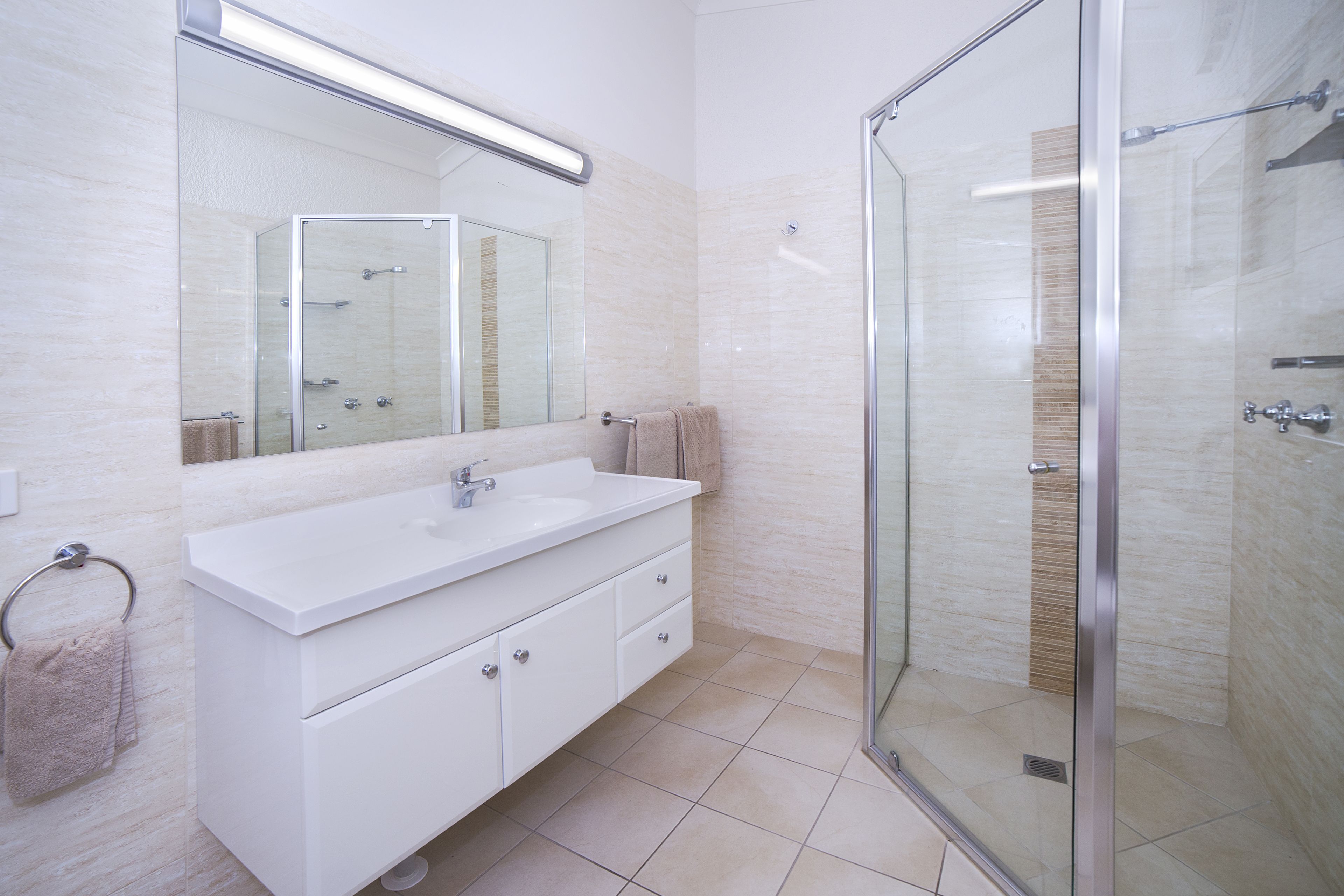 Shower, hydromassage showerhead, designer toiletries, hair dryer