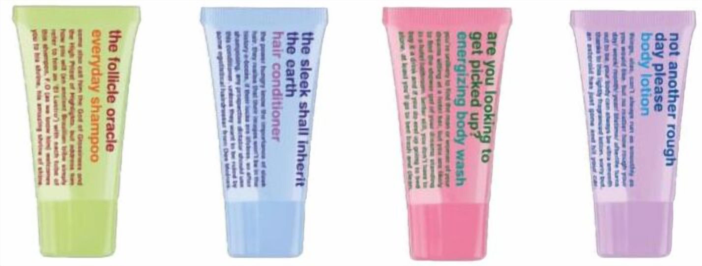 Four tubes of body lotion with different text on each.