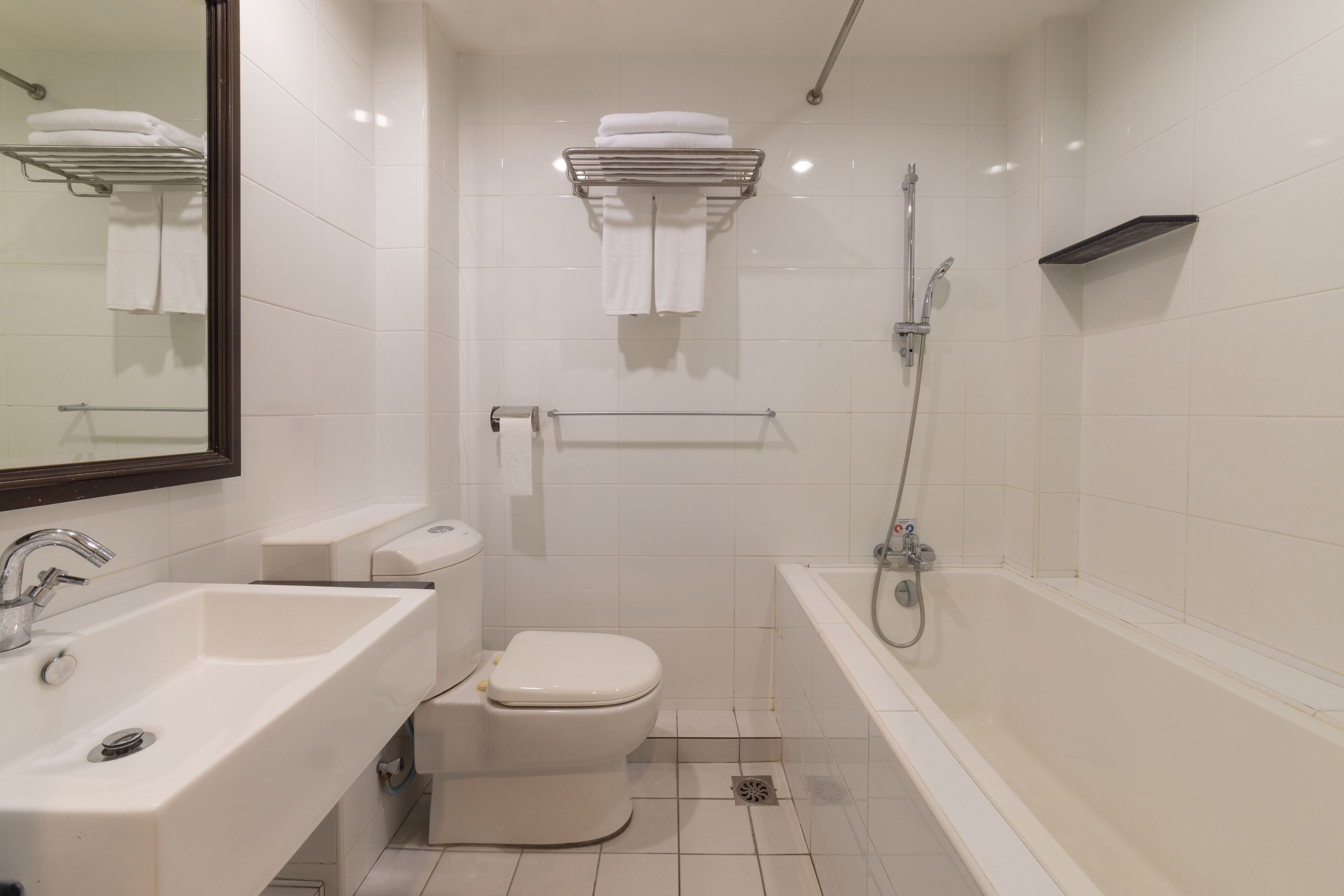 junior suite | bathroom | shower, hair dryer, towels
