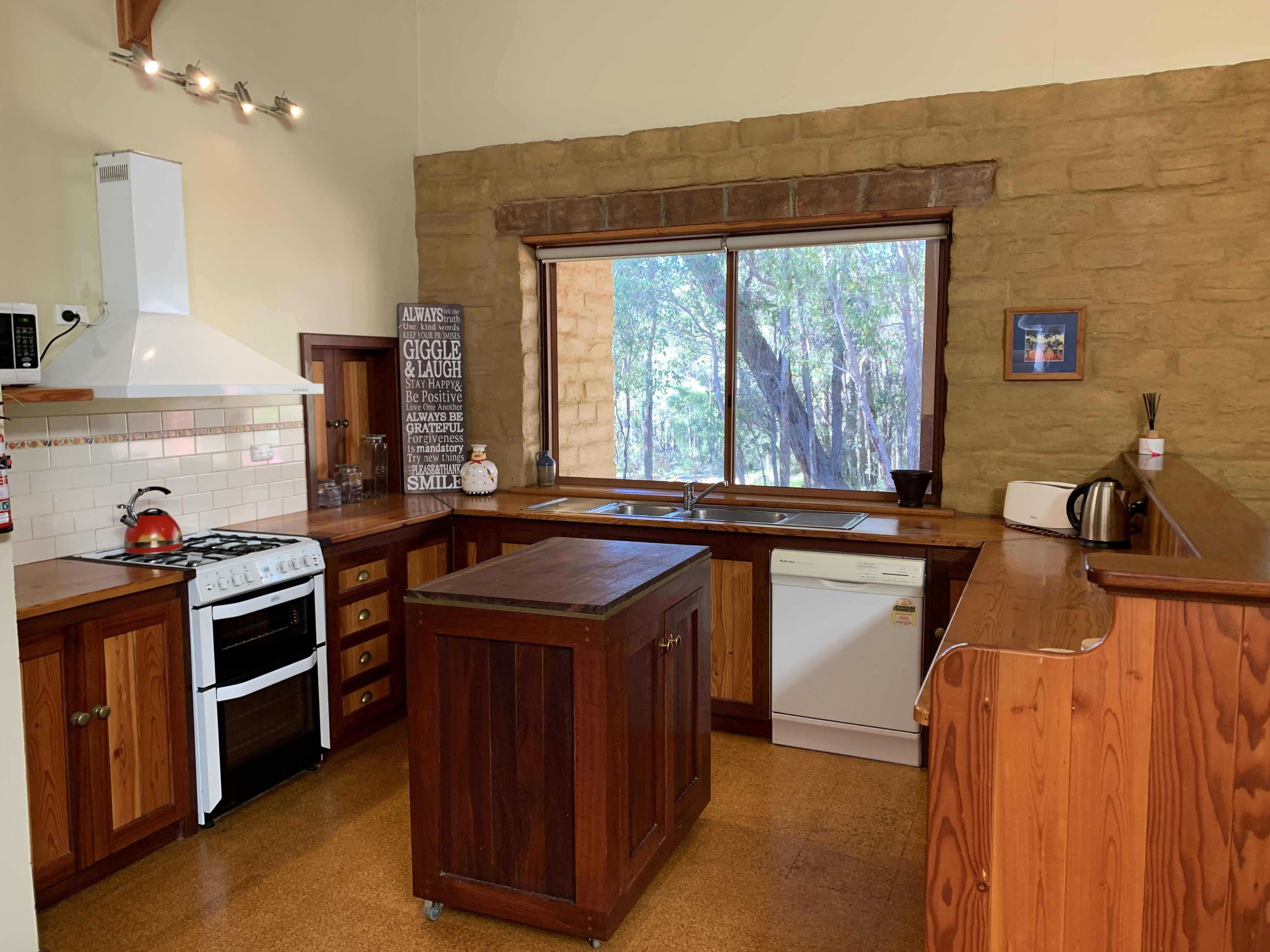 full-sized fridge, microwave, oven, stovetop