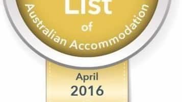A gold-colored badge with the text "Gold List of Australian Accommodation" and the date "April 2016".