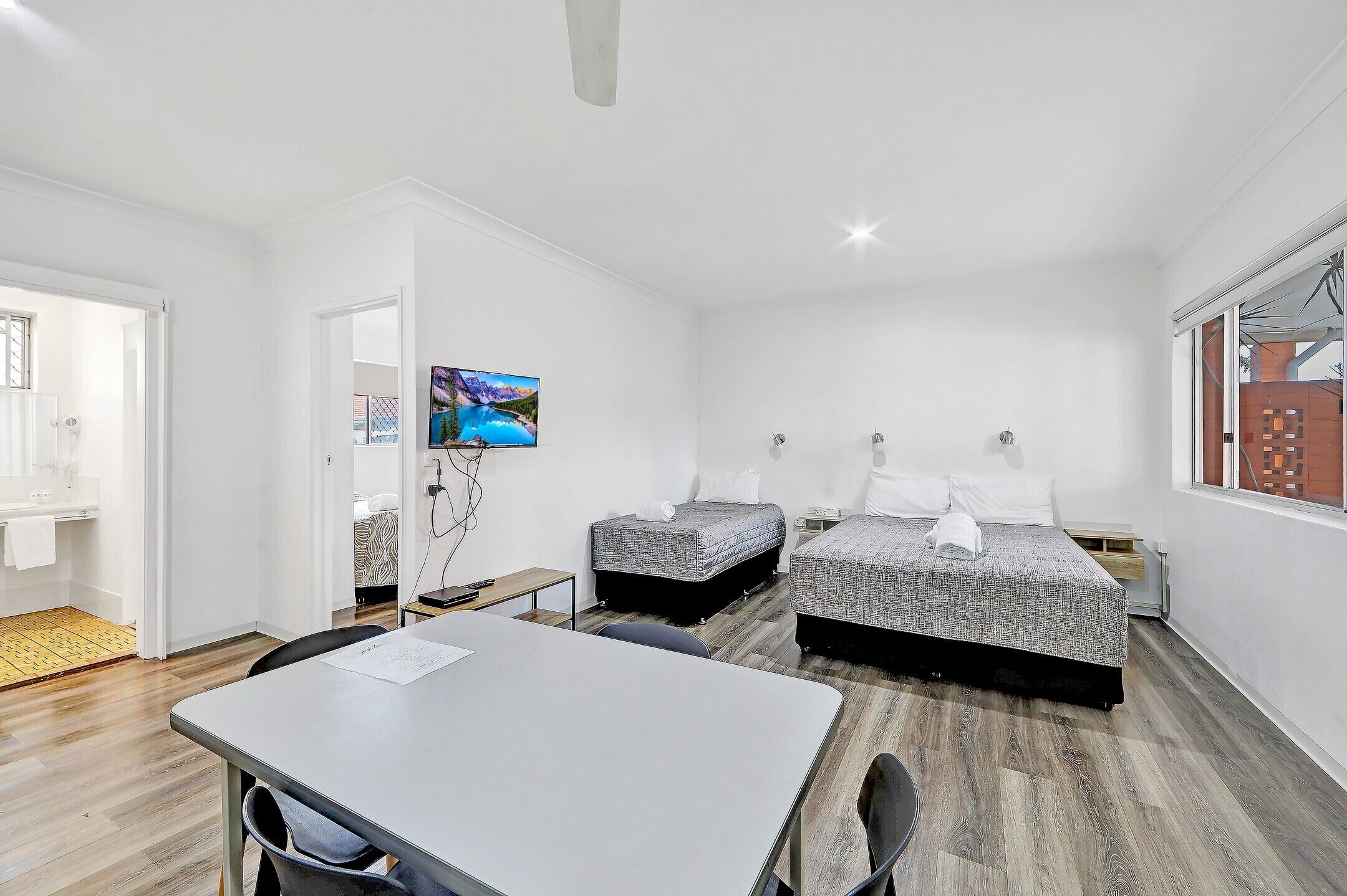 Family Room, Multiple Beds | Desk, iron/ironing board, free WiFi, bed sheets