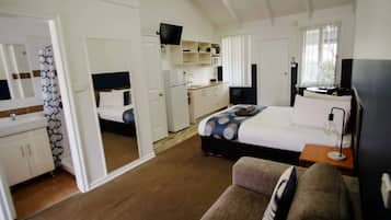 Standard Double Room | Living area | Flat-screen TV