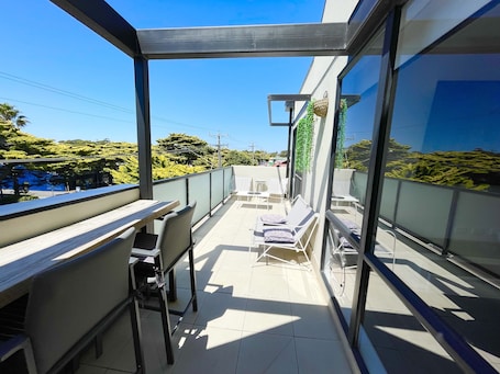 Terraza o patio. Oceanic On Thompson Apartments