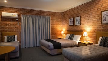 Family Room, Non Smoking | Minibar, individually decorated, individually furnished, desk