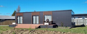 Casa Deluxe | Área de sala de estar | Televisión LCD 