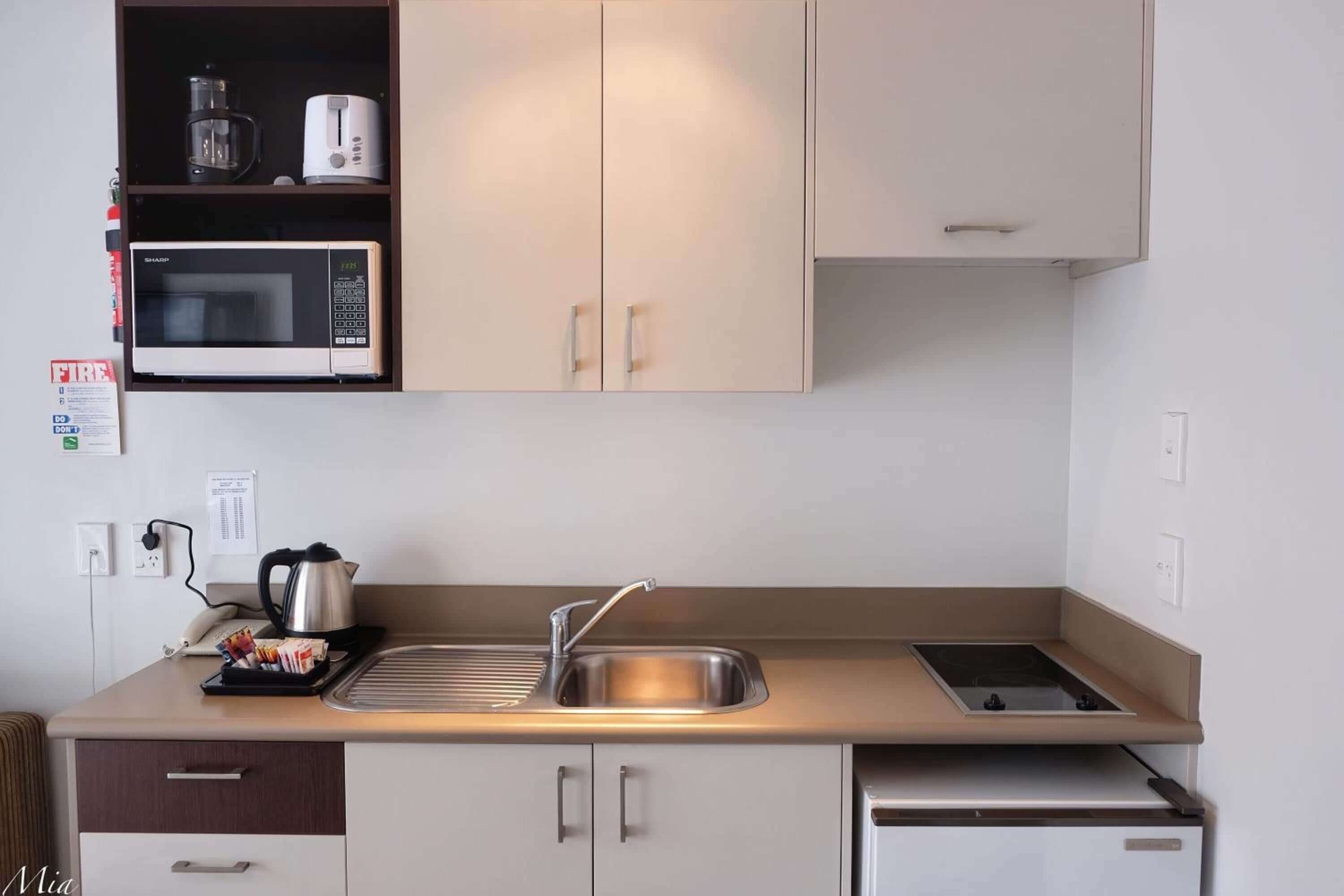 Fridge, microwave, coffee/tea maker, electric kettle