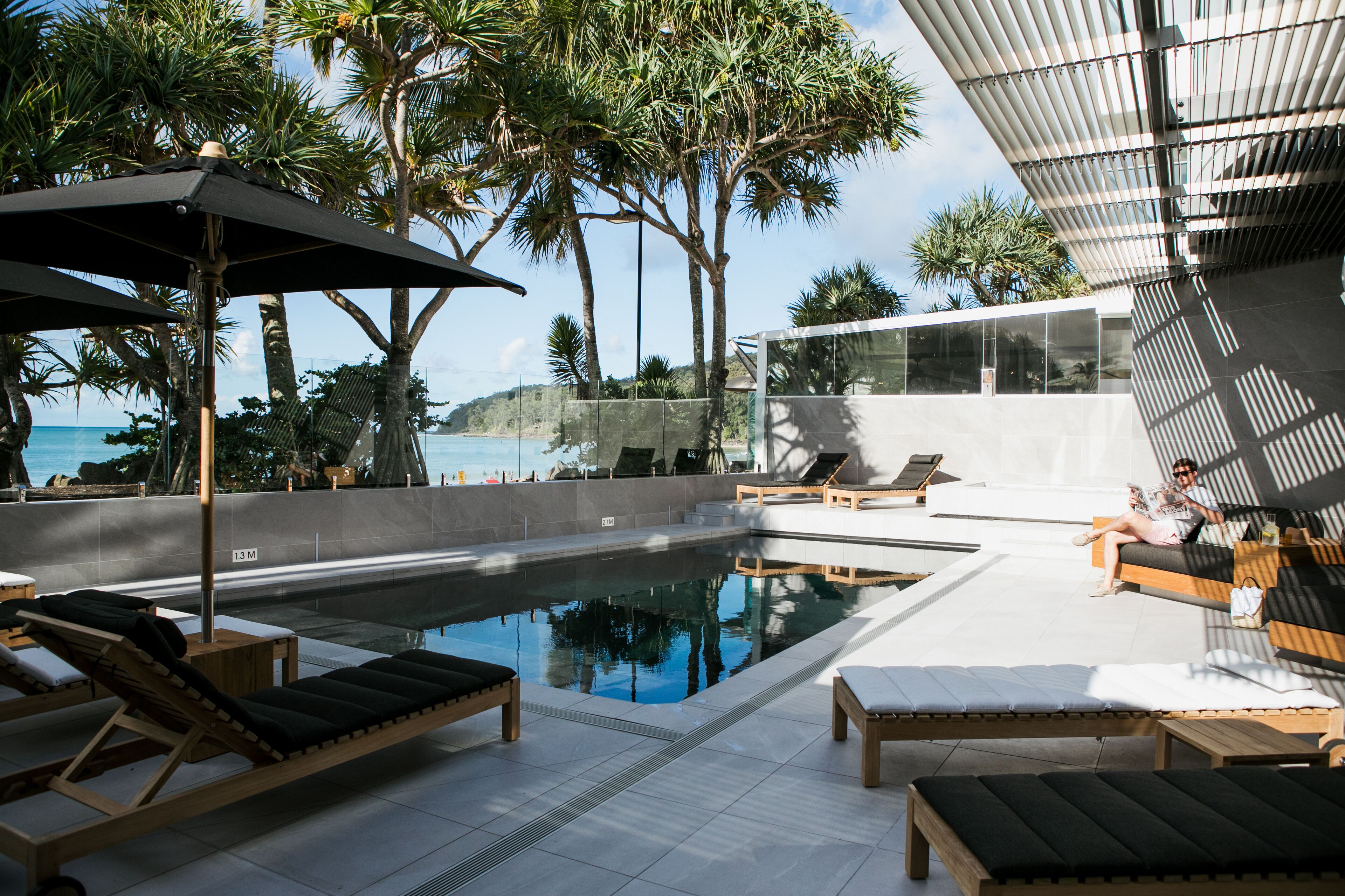 outdoor pool, open 7:00 am to 7:00 pm, pool umbrellas, pool loungers