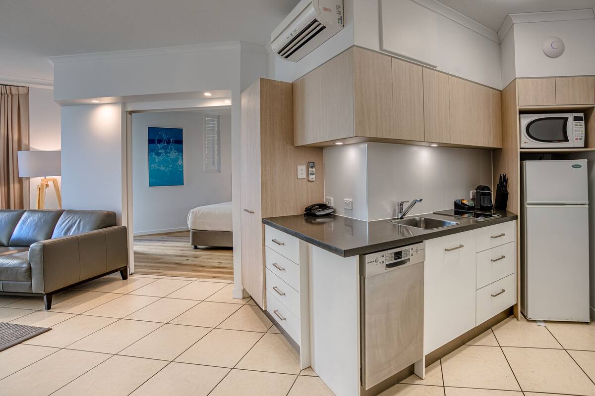 one bedroom partial beach view | private kitchenette | full-sized fridge, microwave, stovetop, dishwasher