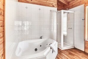 Suite, 2 Bedrooms, Jetted Tub | Bathroom | Shower, free toiletries, hair dryer, towels