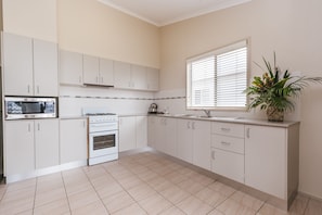 Standard Suite, Multiple Bedrooms, Non Smoking, Kitchen (3 Brm Beachfront Villa) | Private kitchen - Clyde View Holiday Park (Batehaven)
