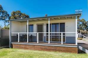 Deluxe Suite, 2 Bedrooms, Non Smoking, Kitchen (Deluxe Waterfront) | Terrace/patio - Clyde View Holiday Park (Batehaven)