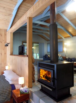 Dreamtime: Rainforest Treehouse | Living area | Flat-screen TV - Treetops Accommodation Montville (Flaxton)