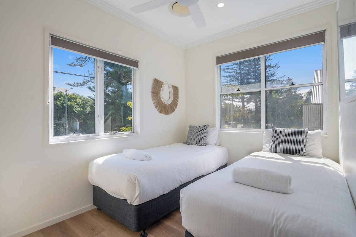 Azur Beach House | 1 bedroom, in-room safe, individually decorated, iron/ironing board