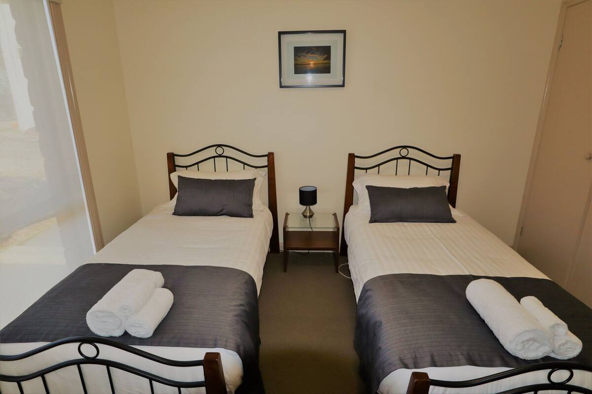 Premium bedding, blackout drapes, individually decorated