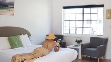 Standard Queen Room | Premium bedding, laptop workspace, blackout curtains, soundproofing