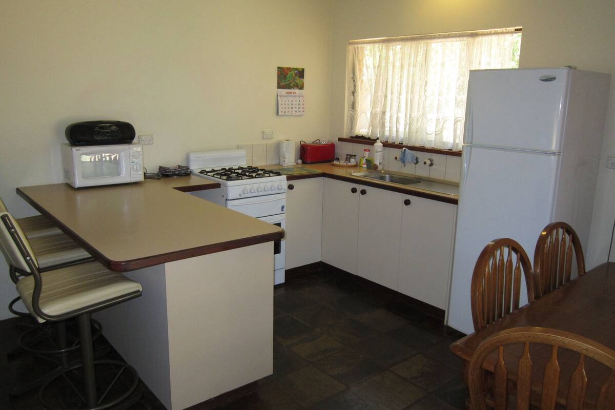 fridge, toaster, cookware/dishes/utensils