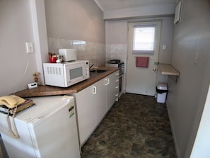 Suite estándar, 2 habitaciones | Cocina privada | Frigorífico grande, microondas, horno y placa de cocina