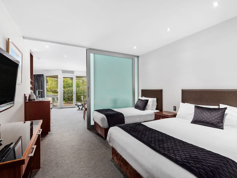 Two-Bedroom Suite | Minibar, iron/ironing board, free WiFi, bed sheets