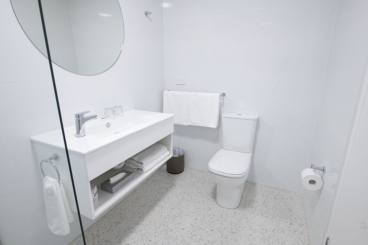 superior triple room | bathroom | shower, towels