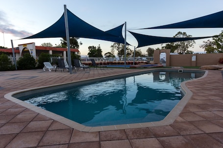 Outdoor pool, open 8:00 AM to 7:00 PM, sun loungers
