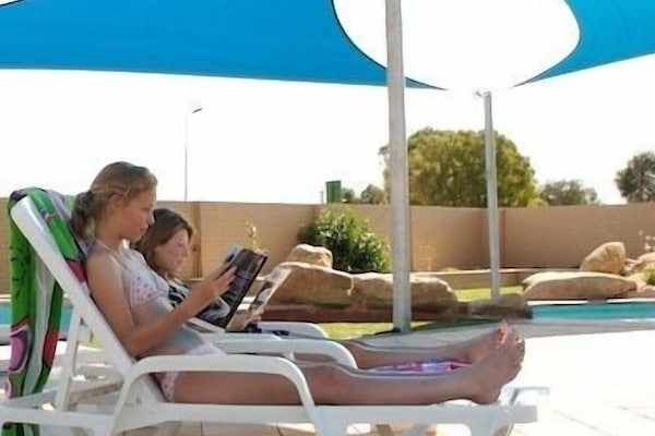 Outdoor pool, open 8:00 AM to 7:00 PM, sun loungers