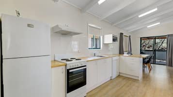 Spa Cottage Two Bedrooms (6 Berth) | Private kitchen | Full-size fridge, microwave, stovetop, electric kettle