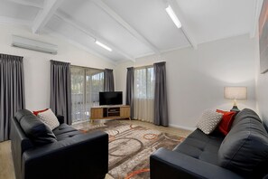 Spa Cottage Two Bedrooms (6 Berth) | Living area | 40-inch Smart TV with digital channels