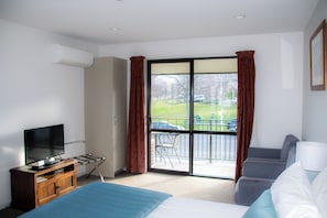Standard Studio - King Upstairs | Blackout drapes, iron/ironing board, free WiFi, bed sheets