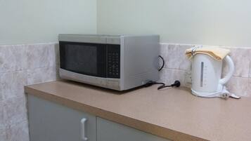 Fridge, microwave, coffee/tea maker, electric kettle