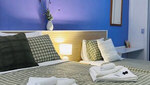 Family Room, Patio | Laptop workspace, WiFi (free), bed sheets