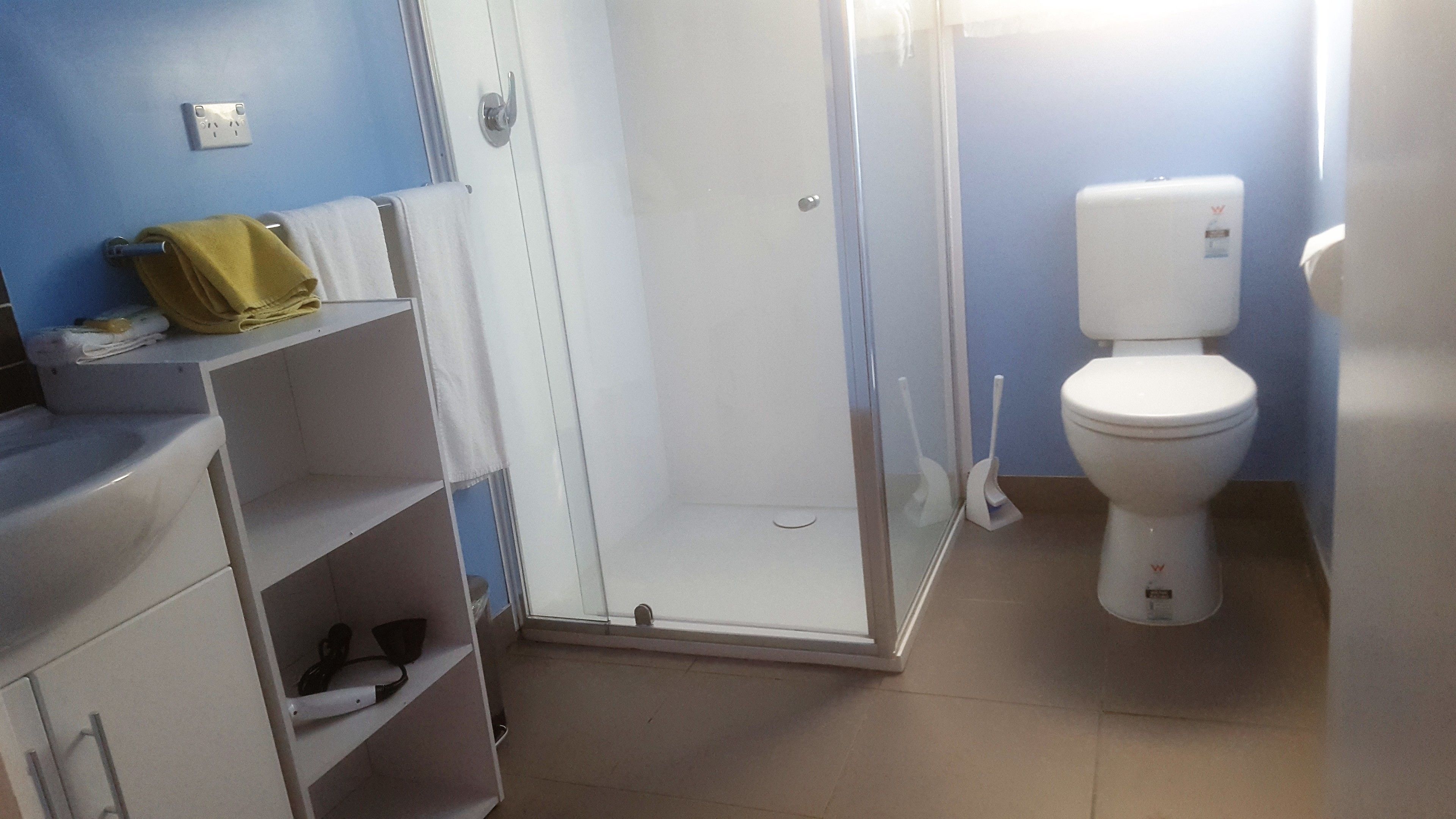 Shower, rainfall showerhead, towels