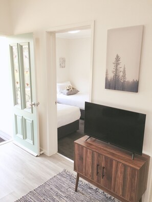 Renovated Hometown Cabin (Sleeps 4) | Living room | TV - Nepean by Gateway Lifestyle Holiday Parks (Jamisontown)