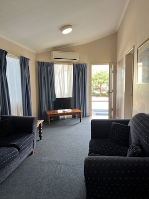 Original Family Cabin | Living area | TV