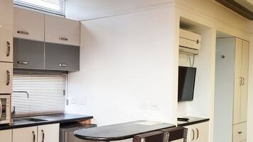 Fridge, microwave, coffee/tea maker, electric kettle