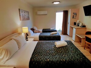 Family Room, Non Smoking | Premium bedding, minibar, iron/ironing board, free WiFi
