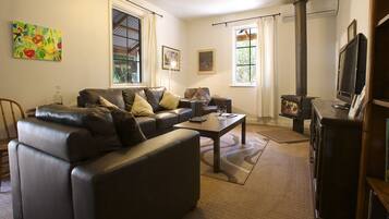 Cottage, 2 Bedrooms | Living area | Fireplace, Netflix