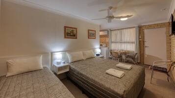 Desk, blackout drapes, soundproofing, iron/ironing board