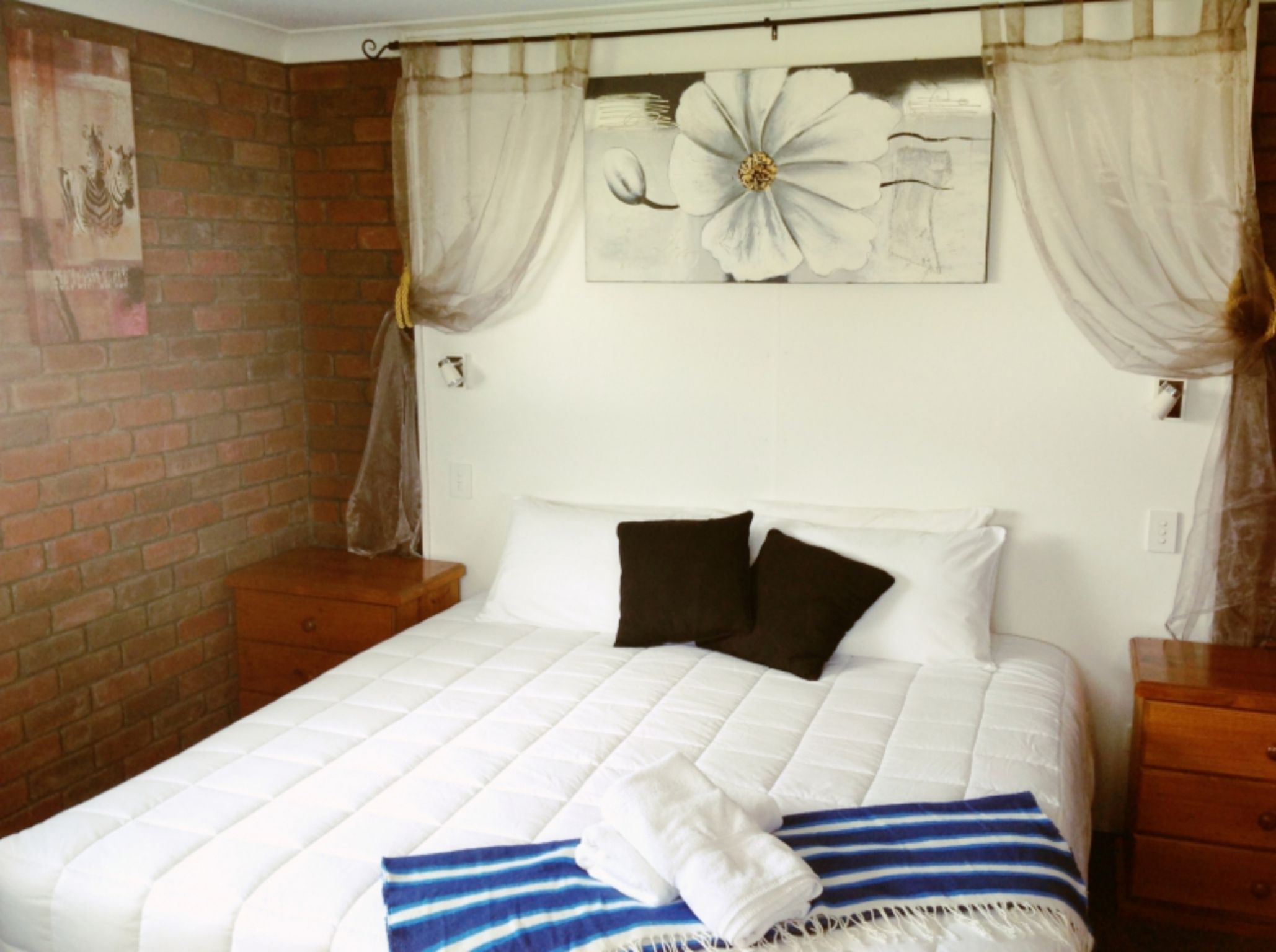 Premium bedding, pillow-top beds, blackout curtains, iron/ironing board