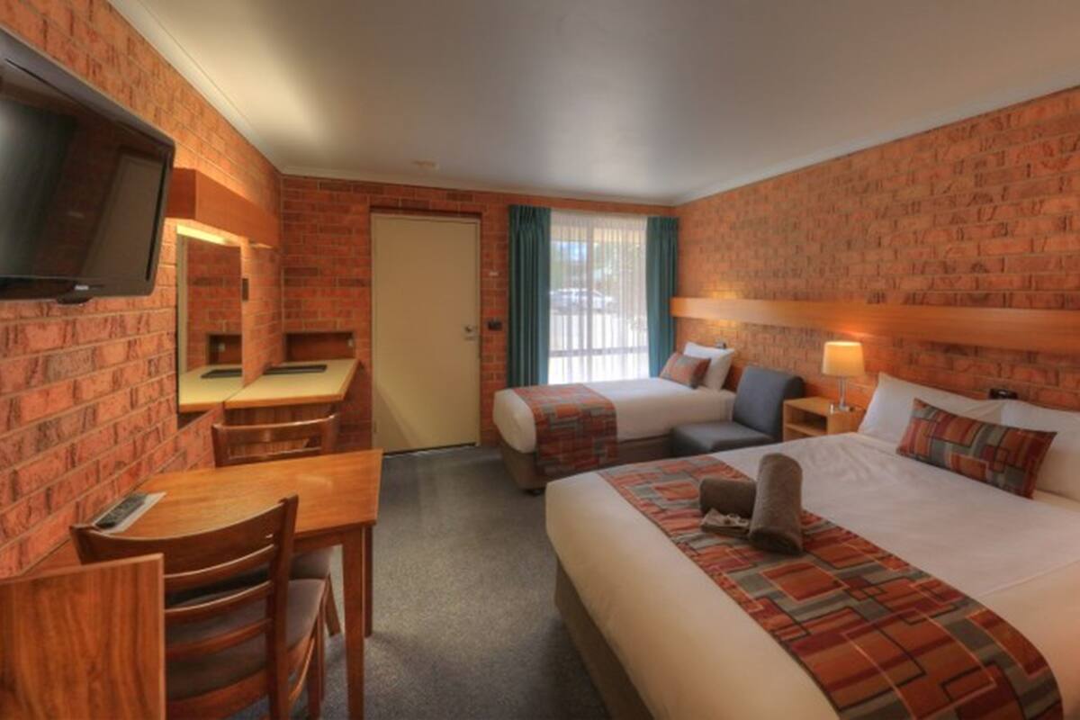 Twin Room | Blackout drapes, iron/ironing board, WiFi (free), individually decorated