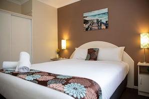 Fer et planche à repasser, Wi-Fi gratuit, draps fournis