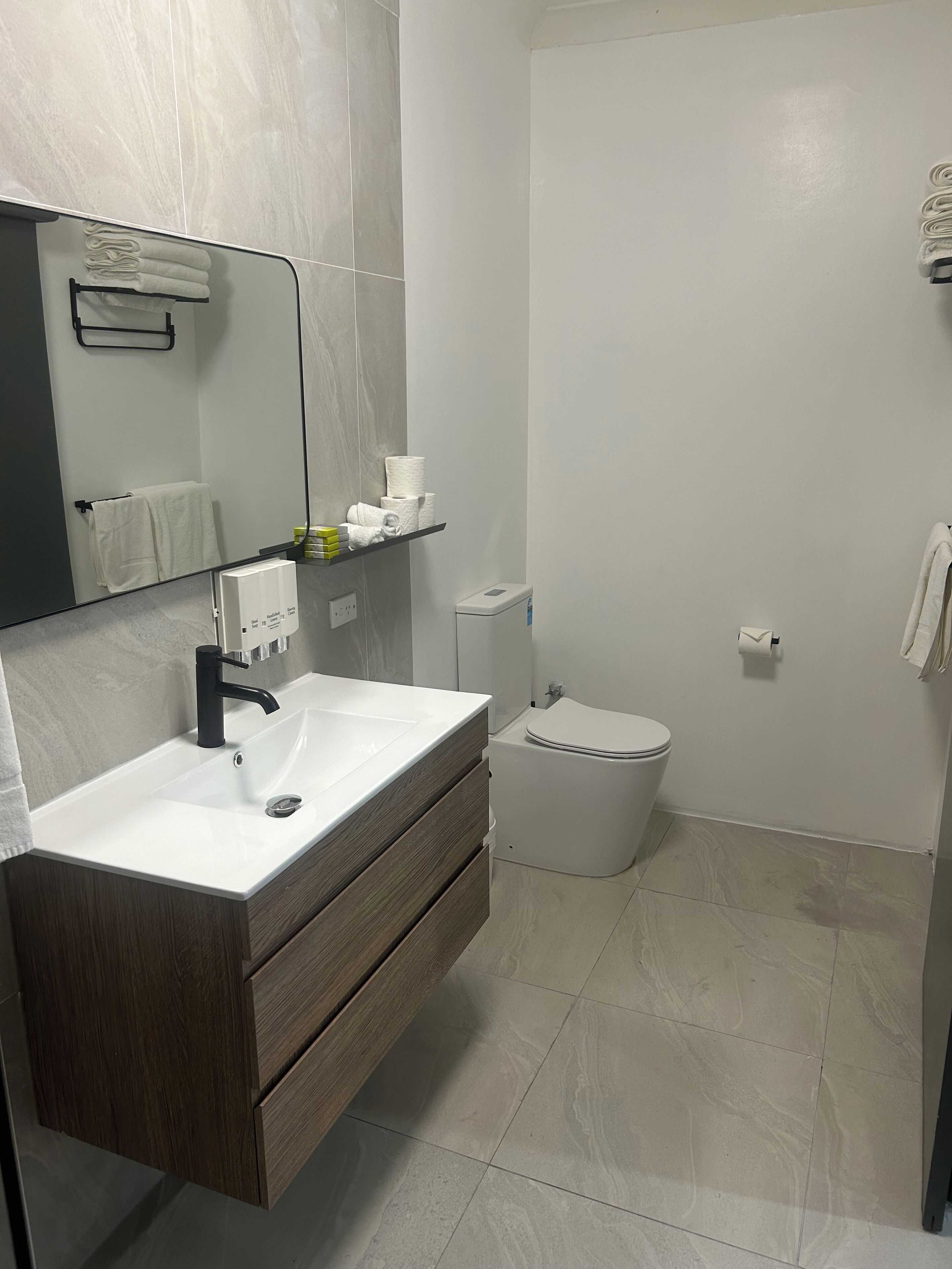 large family room | bathroom | shower, free toiletries, hair dryer, towels