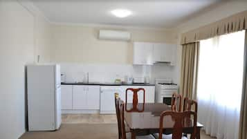 Family Suite, 3 Bedrooms, Kitchen | Private kitchen | Fridge, coffee/tea maker, electric kettle