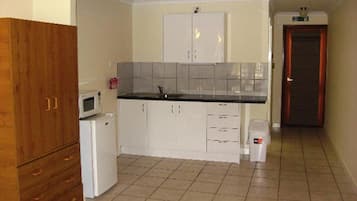 Fridge, microwave, coffee/tea maker, electric kettle