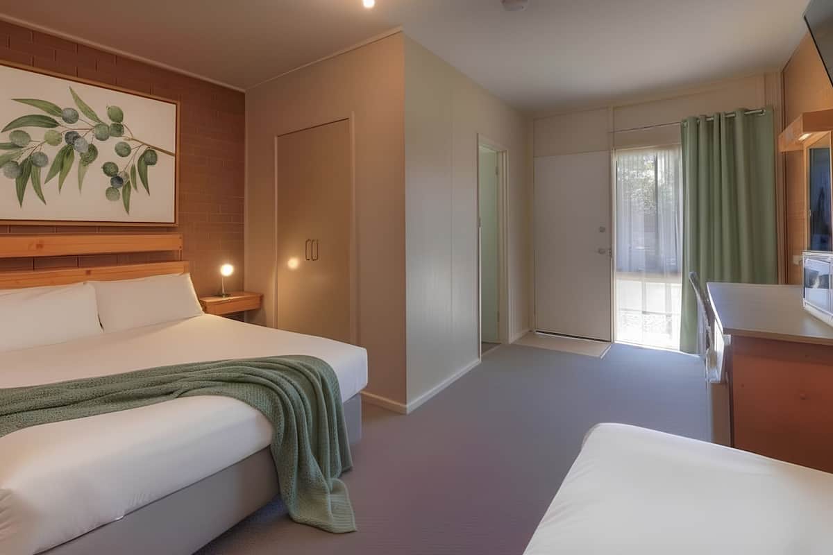 Chambre avec lits jumeaux | Bureau, fer et planche à repasser, Wi-Fi gratuit