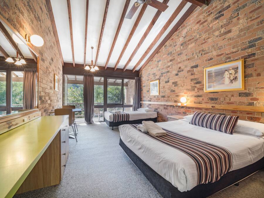 Desk, bed sheets, wheelchair access