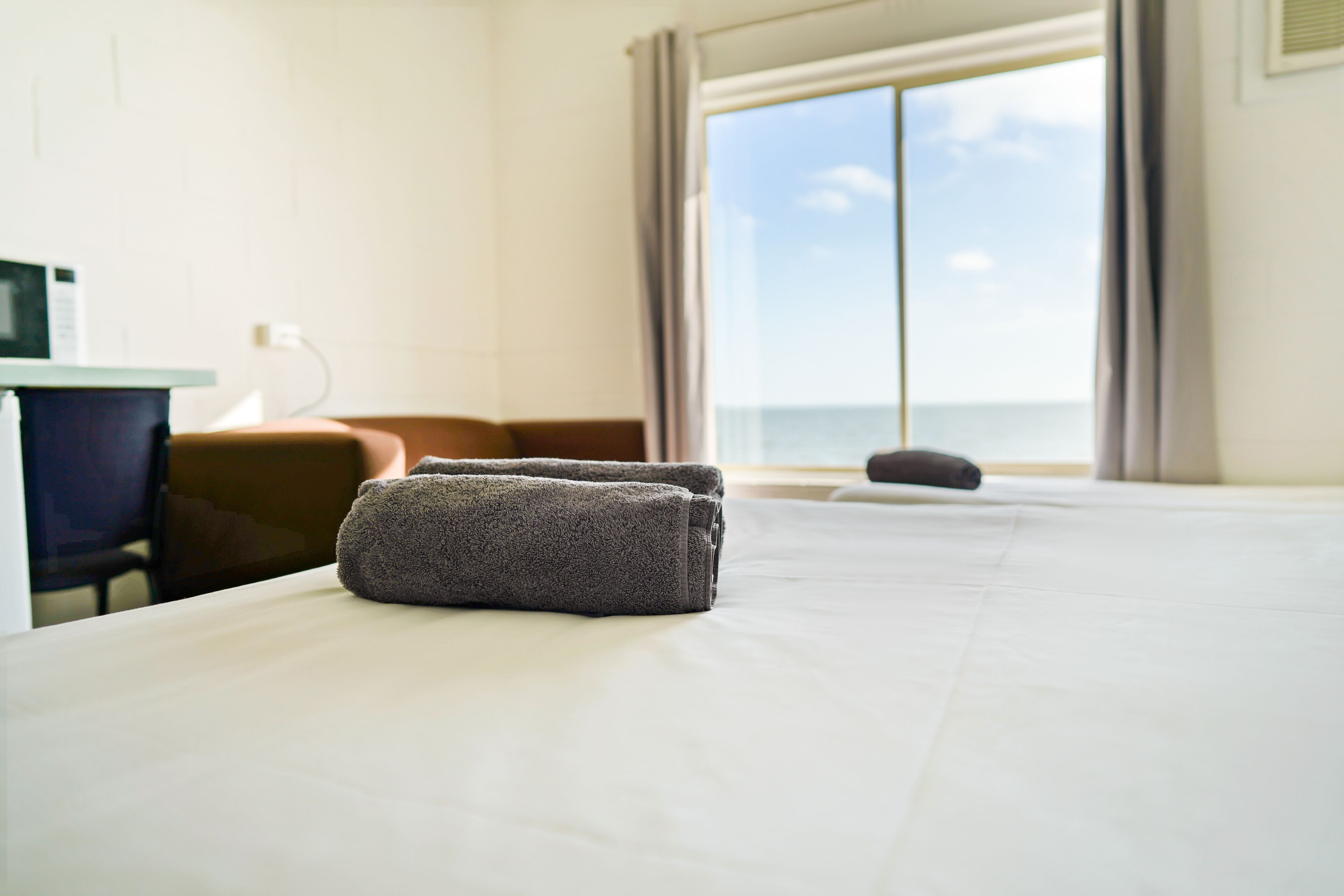 Familienzimmer (Family Waterfront Room) | Verdunkelungsvorhänge, Bügeleisen/Bügelbrett, kostenloses WLAN
