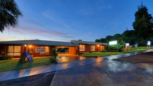 A two-story building with a sign indicating 'Under New Management'. - Country Roads Motor Inn Narrandera (Narrandera)