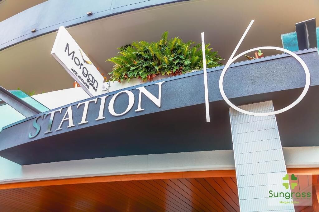 A hotel sign with the name 'Morgan Station' and a smaller sign indicating 'Hotel Marriott'.